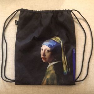 Girl with Pearl Earring Drawstring bag.